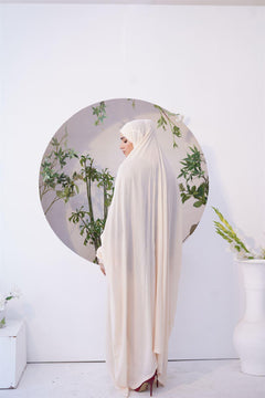 a women wearing Namaz Chadar Online in cream color color