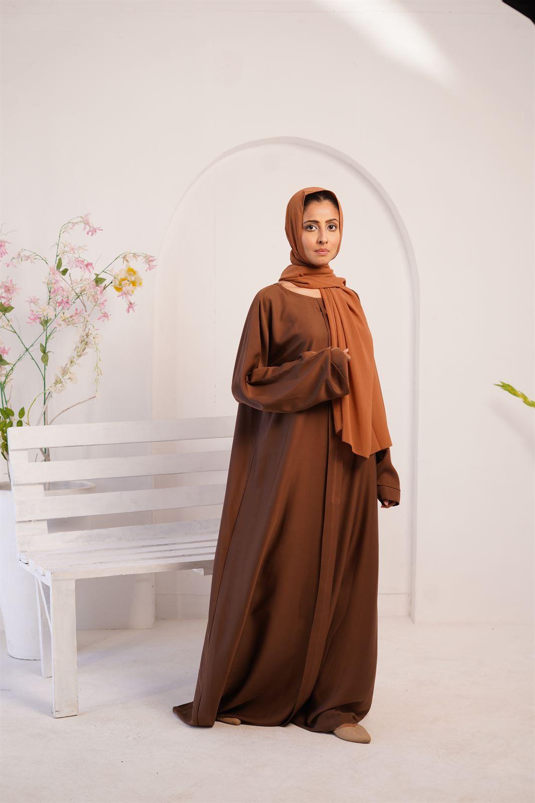 Amirah Abaya Online Pakistan. Model wearing brown color abaya.