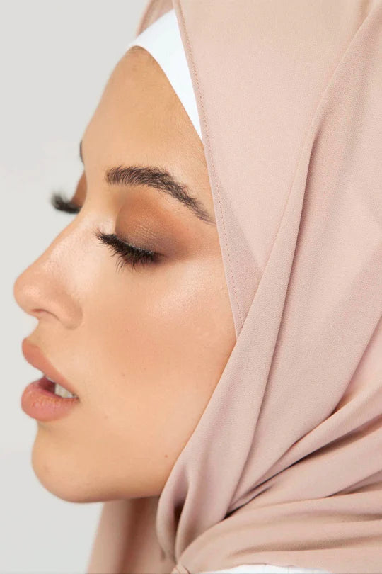 Georgette Hijab Online Pakistan, in color. Side profile of a women wearing it .