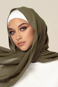 woman wearing Hijab in sage color.