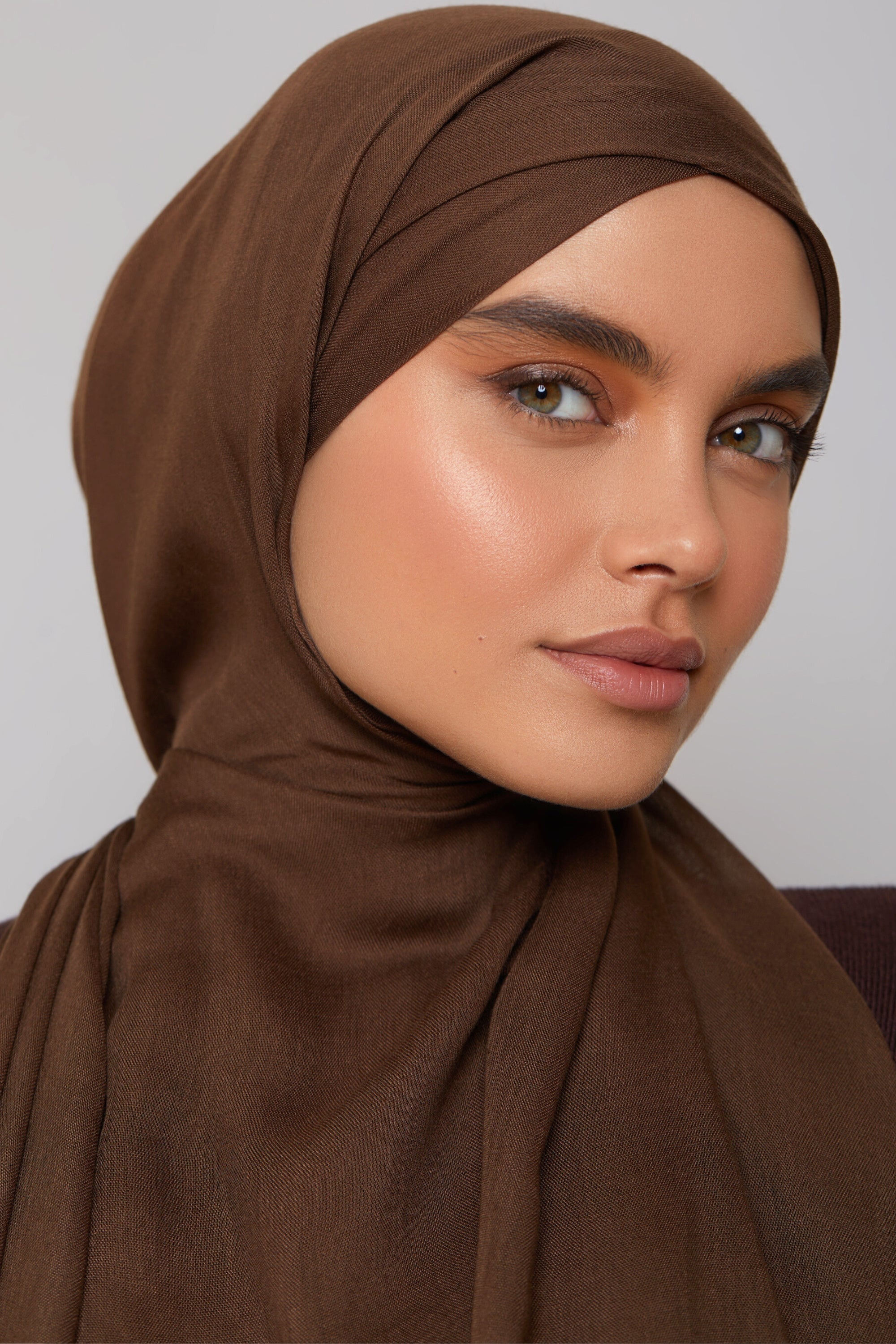 Girl Wearing Dark Brown Premium modal fabric Hijab. Shop Online at Hijabandco.