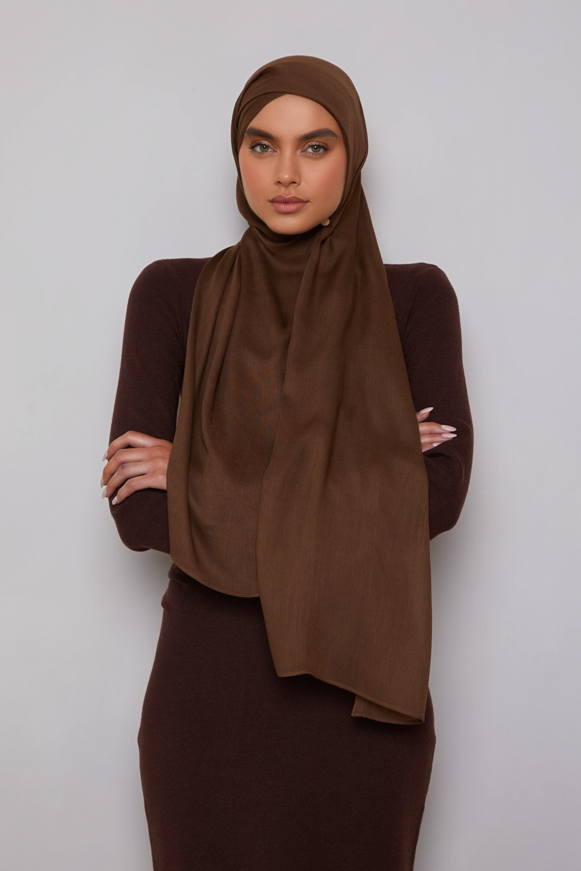 Girl wearing dark brown modal fabric hijab. Shop Online at Hijabandco Pakistan.