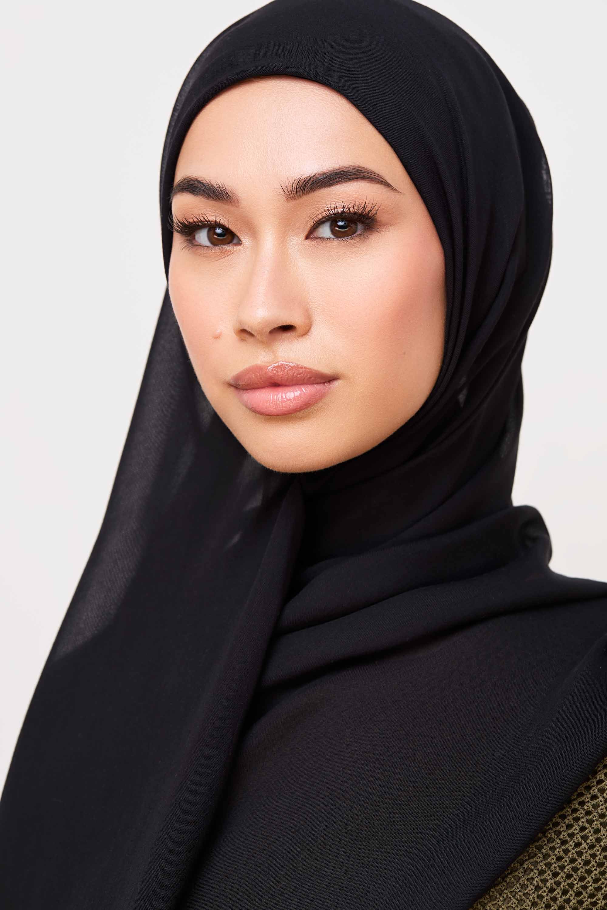 Girl wearing Modal Hijab in Black. Shop Eco friendly hijabs at Hijabandco Pakistan.